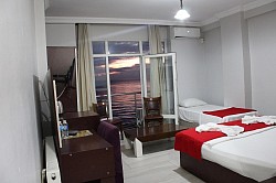 BALKONLU DENİZ MANZARALI ODALAR